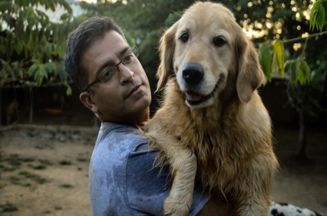 indian businessman opens his home to 700 homeless dogs