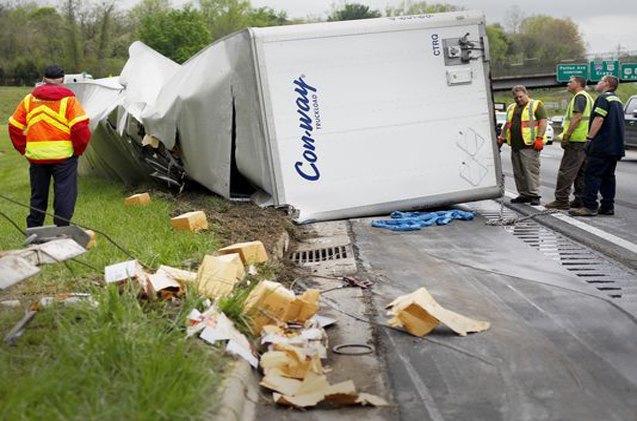 truck carrying dog food overturns on highway bad dogs suspected