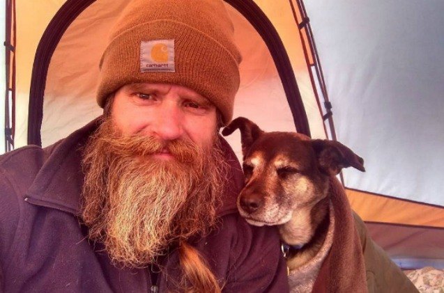 homeless veteran and his dog hit while riding bike for awareness