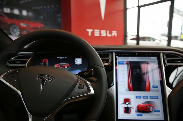 can teslas cabin overheat tech save dogs in hot cars