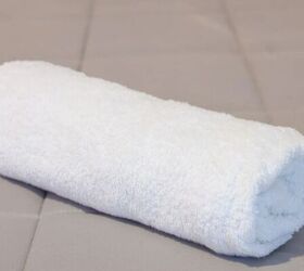 is your dog bored 3 diy brain games to keep them happy, Rolled up towel image via Canva
