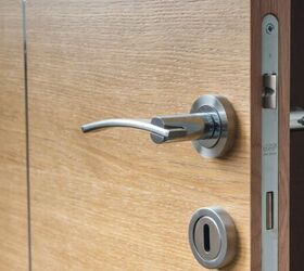 how to stop your cat from waking you up in the morning, Door image via Canva